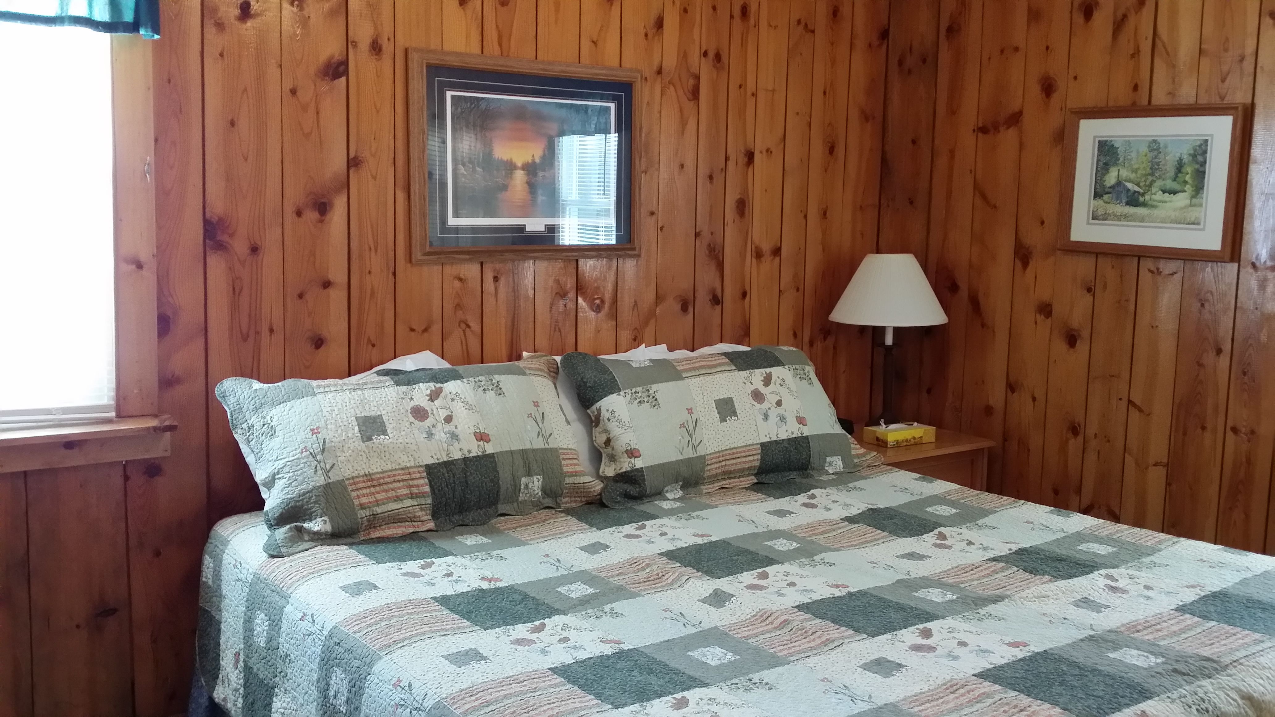 King Bed, double windows. Cozy cabin