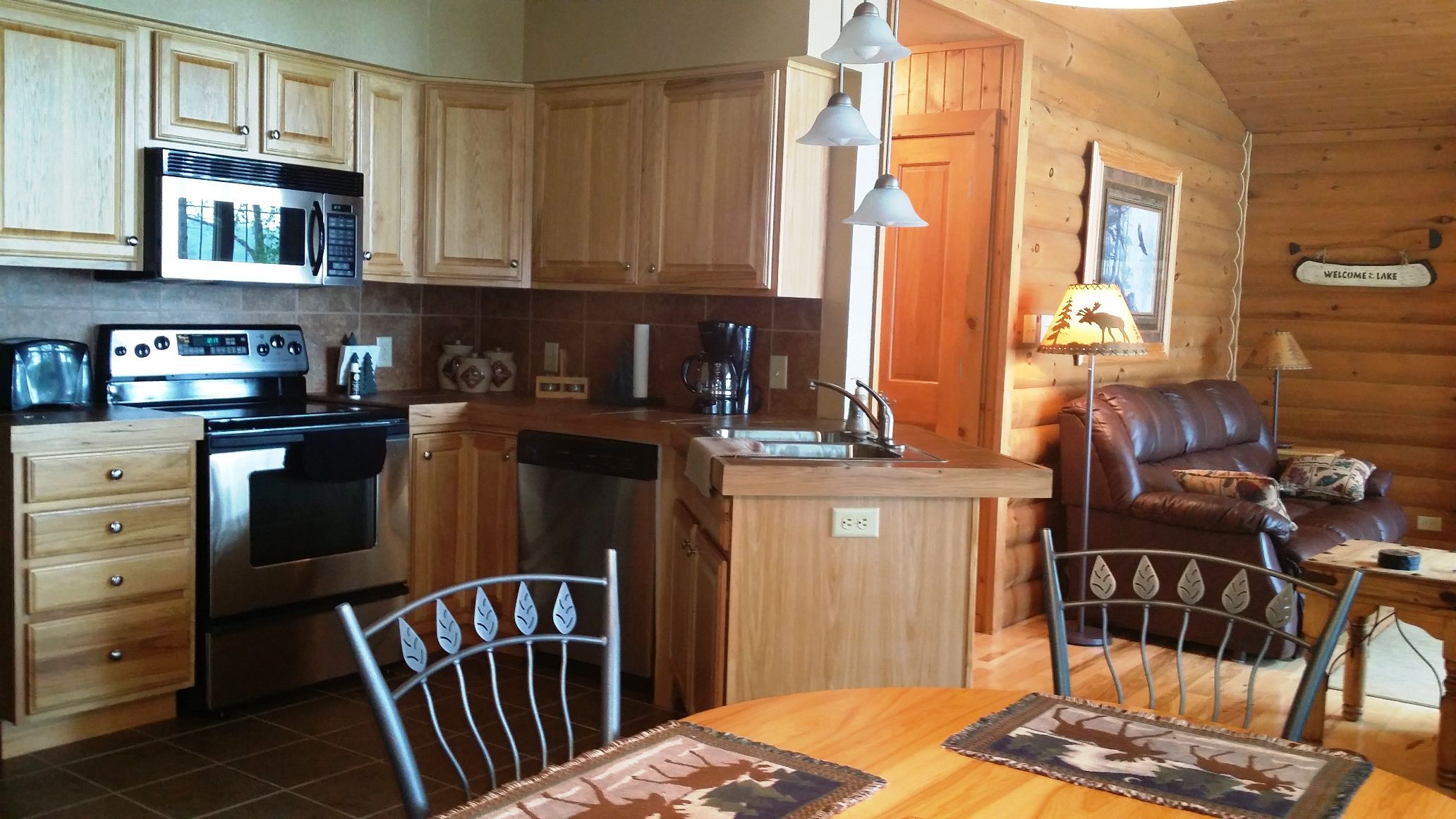 Efficient custom kitchen. Good counter space.