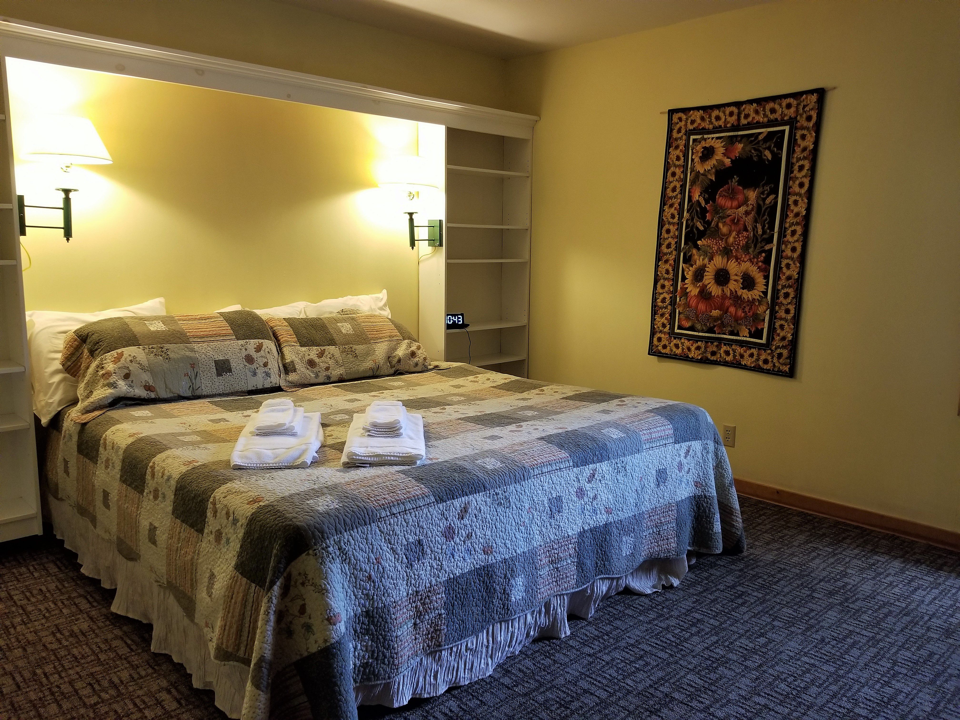 The king bedroom is large with built ins, a television and washer/dryer nook